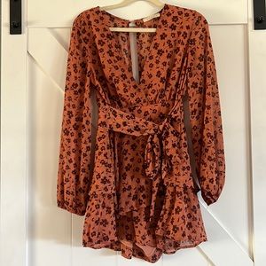 Romper open back size medium
